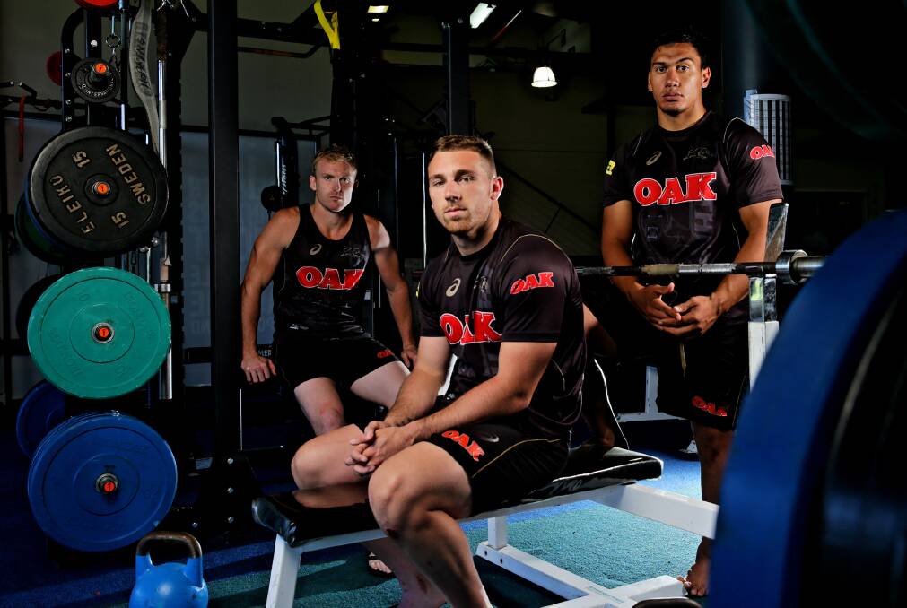 Penrith Panthers captain Peter Wallace (left) with teammates Bryce Cartwright and Elijah Taylor, are gearing up for another successful NRL season. Photo: Wolter Peeters/SMH.