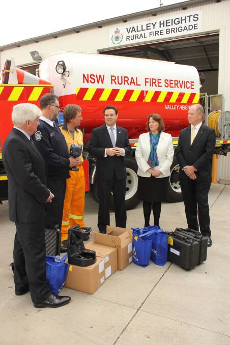 Grand Master of Freemasons NSW/ACT Derek Robson, NSW RFS Superintendent David Jones, Valley Heights RFS brigade captain Steve Price, Minister for Emergency Services Stuart Ayres, Blue Mountains MP Roza Sage and Masonicare chairman Andrew Fraser MP last Friday.