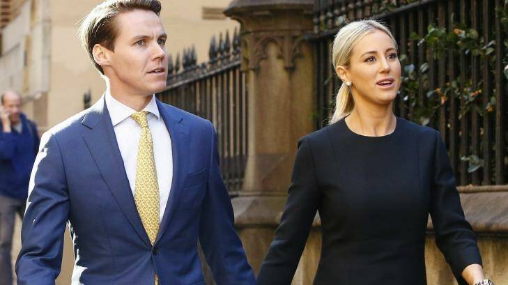 Oliver Curtis and wife Roxy Jacenko arrive at the King Street Supreme Court building on Wednesday. Photo: Daniel Munoz