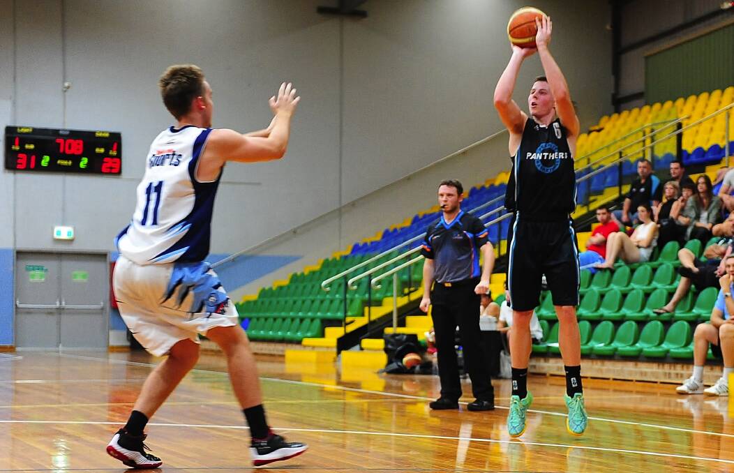 Nic Pozoglou in action for the Panthers WCL Men's team in 2014. Photo: Noel Rowsell (www.photoexcellence.com.au)