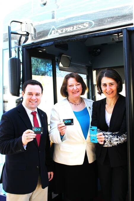 Penrith MP Stuart Ayres, Blue Mountains MP Roza Sage and Transport Minister Gladys Berejiklian with the Opal card which goes live on Blue Mountains buses this week.