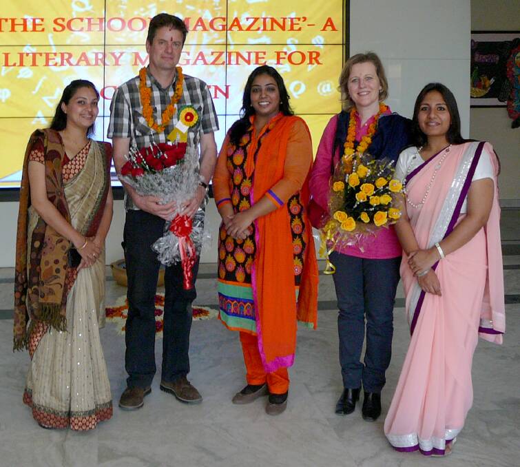 Tohby Riddle presented with flowers, a garland and a bindi at Queen Mary's School, a large Catholic school for girls in Model Town in New Delhi's north. With him are the the school's librarians and his tour guide.