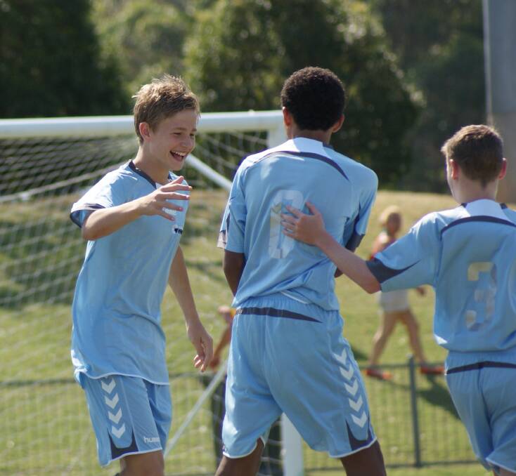 Henry Davies (left) playing for NSW Metro at the U13s at the National Youth Championships in 2012.
