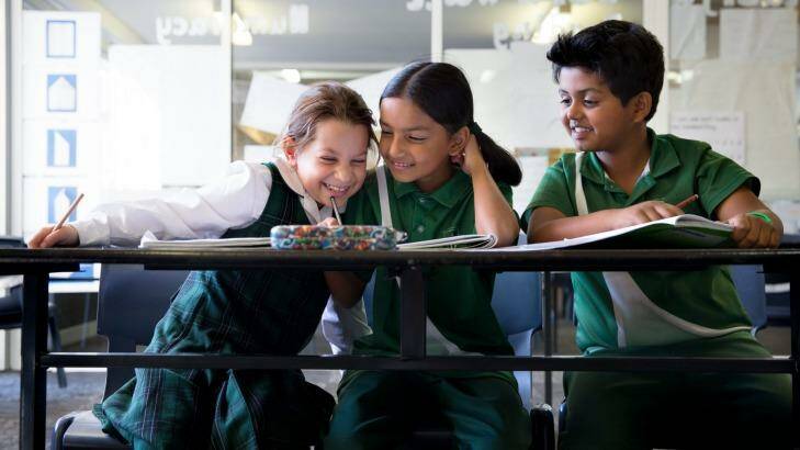 Year 3 students from St. Anthony's in Girraween (from left) Zoe Atkinson, 8, Mokshada Rane, 8, and Aryan Sawant, 8 sit down to their 2016 NAPLAN tests. Photo: Edwina Pickles