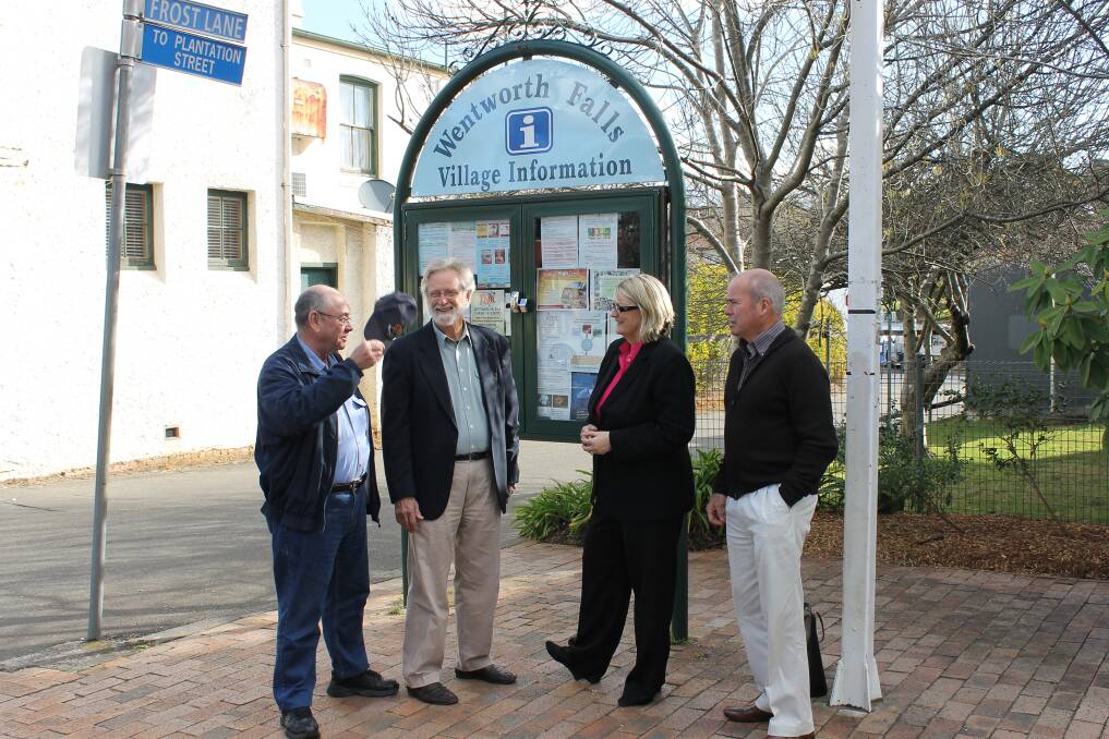 Members of the Wentworth Falls Chamber of Commerce celebrates the new CCTV funding from the federal government. From left:?Vice-president and treasurer Bill McCabe, president Lew Hird, federal member for Macquarie Louise Markus and secretary Bruce Christmas.