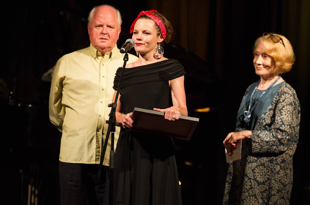 Georgia Adamson accepts her award last week from Sydney Theatre Award presenters John Paramor and Jane Harders, who played Brad and Janet in the original Australian production of The Rocky Horror Picture Show. Photo: Kurt Sneddon.