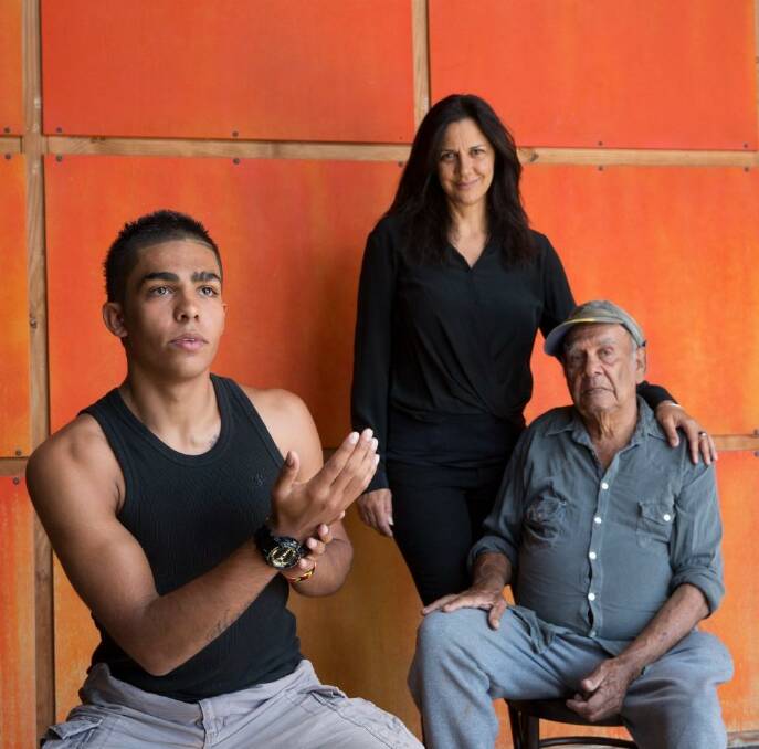 Corroboree Sydney's artistic director Hetti Perkins in 2013 with dancer Karwin Knox (left) and Roy Kennedy from the Corroboree Council of Elders. Photo: Anna Kucera