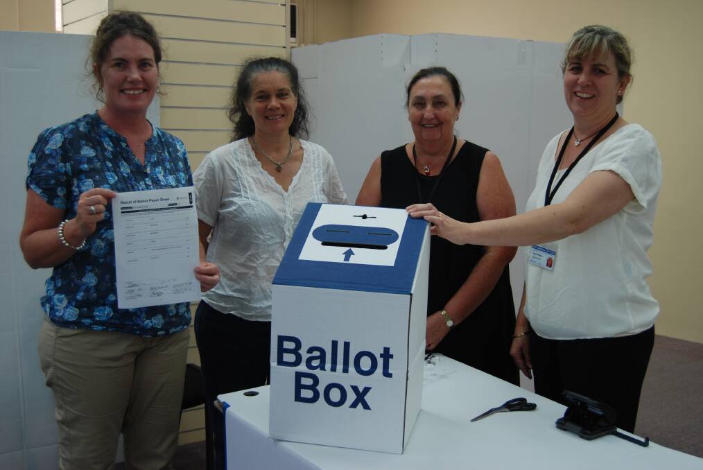 ALP candidate Trish Doyle, Greens candidate Alandra Tasire, Katoomba election officer manager Debi Pope and returning officer Sonya Simson after the ballot draw.