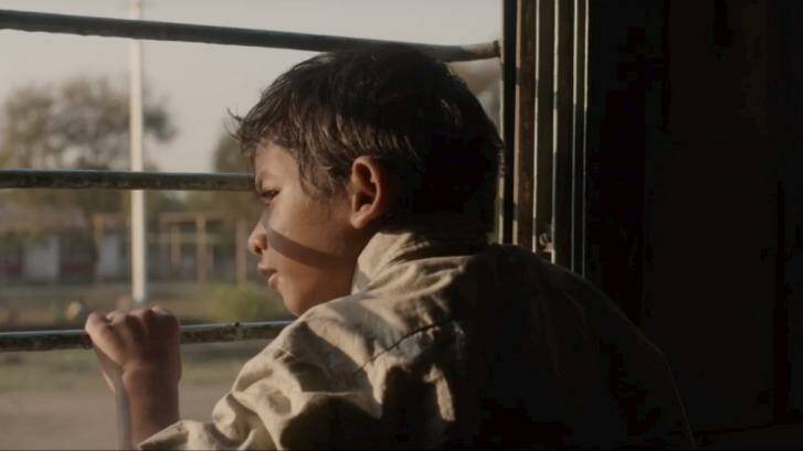 Lost on a train ... Saroo as a boy.