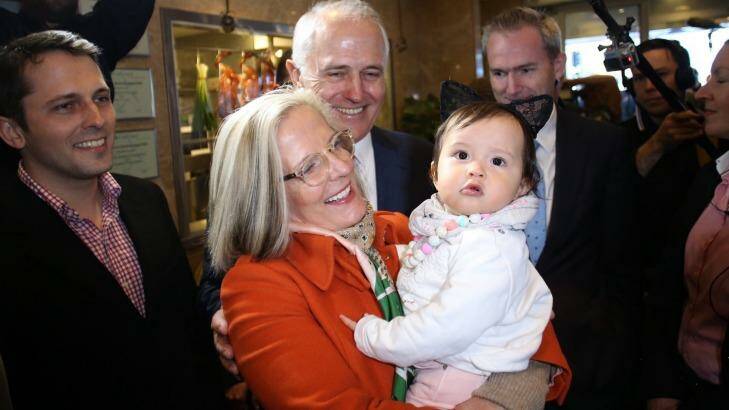 Lucy Turnbull hugs her granddaughter Isla as Prime Minister Malcolm Turnbull and son Alex look on.  Photo: Andrew Meares