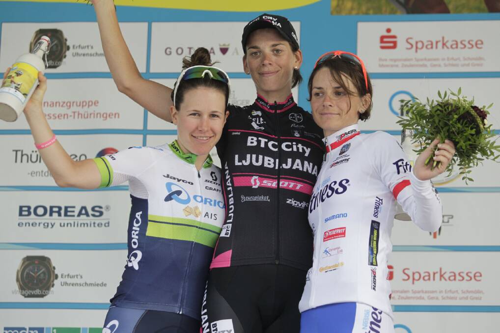 Amanda Spratt (left) on the podium after stage two of the Thuringen-Rundfahrt (German Tour). She finished the seven-stage tour with two second places and one third place. Pictured with winner Eugenia Bujak from Slovenia and third place rider Paulina Brzezna-Bentkowska from Poland. Photo: Anton Vos.