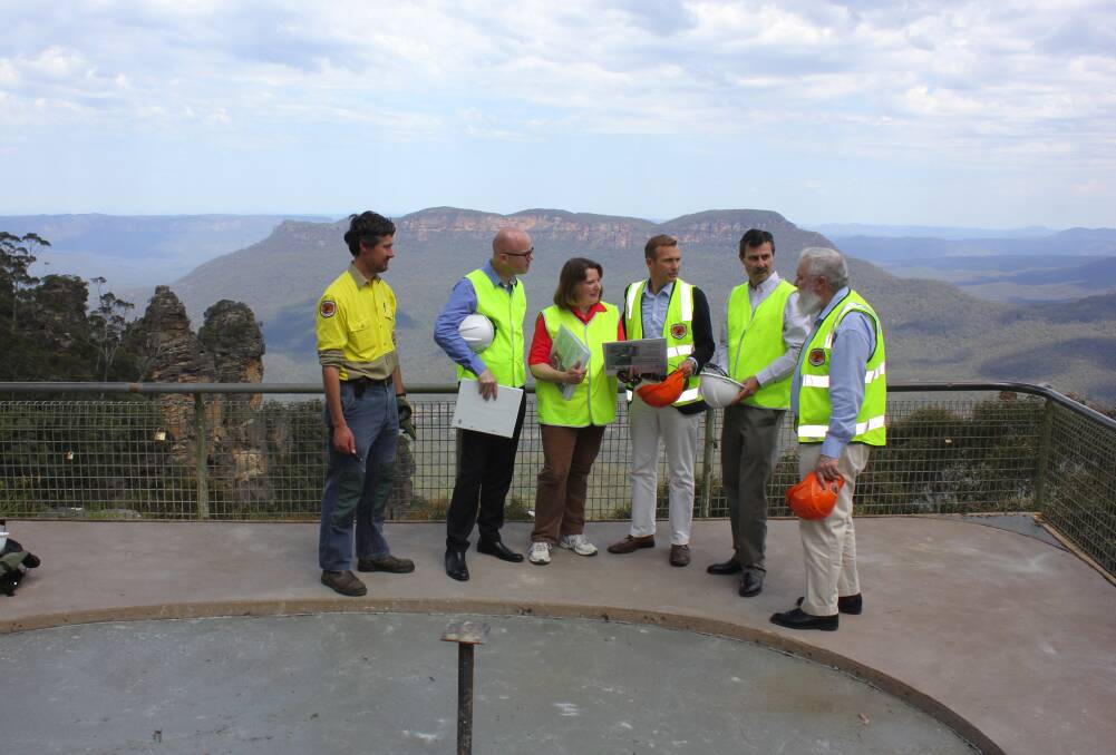 Restoration project manager Tim Lanyon, Blue Mountains mayor Mark Greenhill, MP for Blue Mountains Roza Sage, NSW Environment minister Rob Stokes and National Parks representatives Tom Bagnat and Alan Henderson.