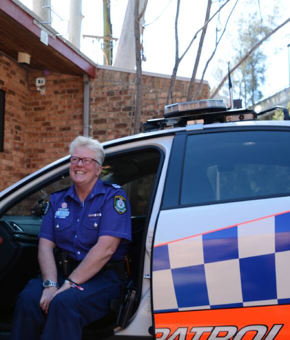 Senior Constable Mary-Lou Keating, who took hundreds of photographs that appear in the book As the Smoke Clears, which has so far raised more than $19,000 for bushfire recovery projects.