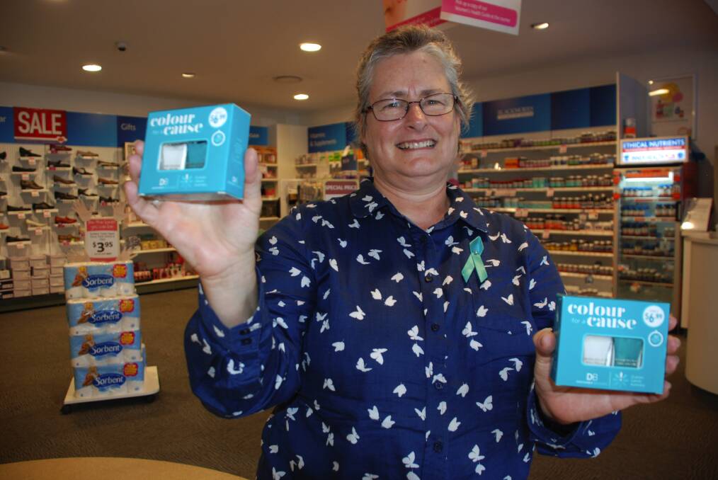 Katoomba's Sue Morrison is battling the "awful disease" which has the lowest survival rate of any women's cancer. She is holding the teal nail polish packs being sold at Chemmart pharmacies to raise awareness about ovarian cancer.