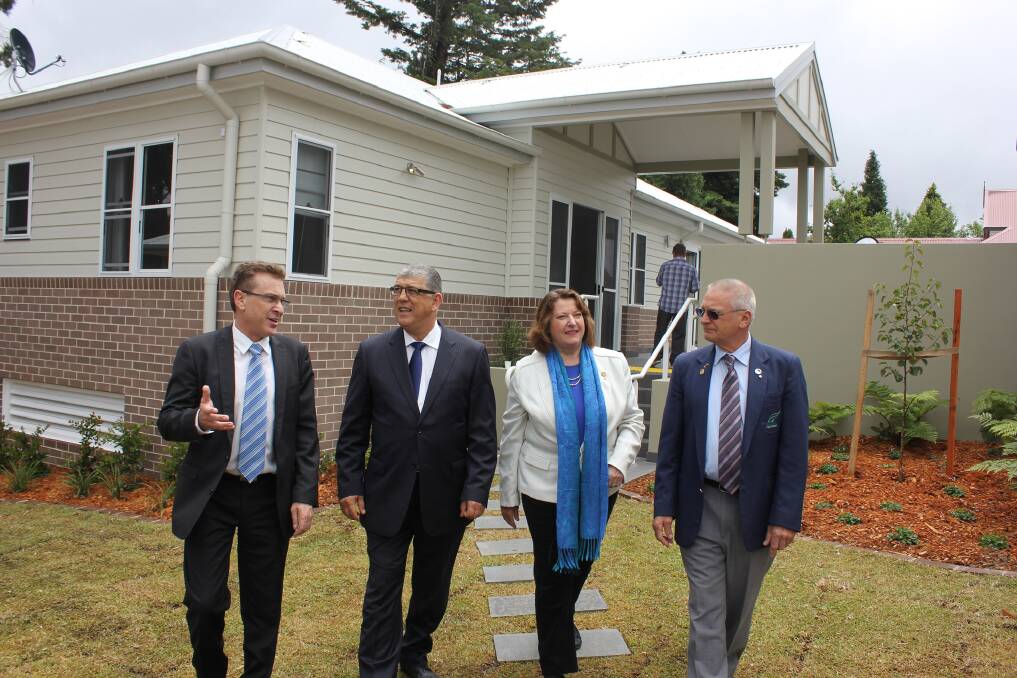 Civic Lifestyles CEO Steven Herald, Minister for Disability Services John Ajaka, Member for Blue Mountains Roza Sage and Blue Mountains Deputy Mayor Chris Van der Kley explore the new group homes in Blackheath.