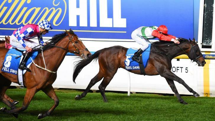 Rebel Dane edges out Canberra's Fell Swoop in the $1m Manikato Stakes at Moonee Valley on Friday night. Photo: Vince Caligiuri