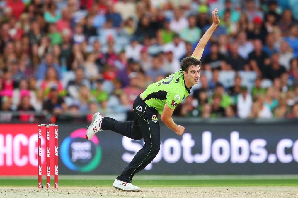 Pat Cummins of the Thunder bowls during the Big Bash League match against the Sydney Sixers at ANZ Stadium on December 27, 2014. Photo: Brendon Thorne/Getty Images.