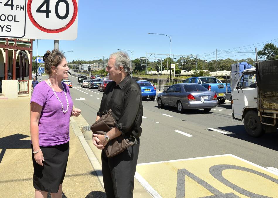 "The Liberals could not possibly have spent the money in the next four years if all this planning and financial preparation had not already been done." Bob Debus, pictured with Labor candidate Trish Doyle, counters claims by the local state member.