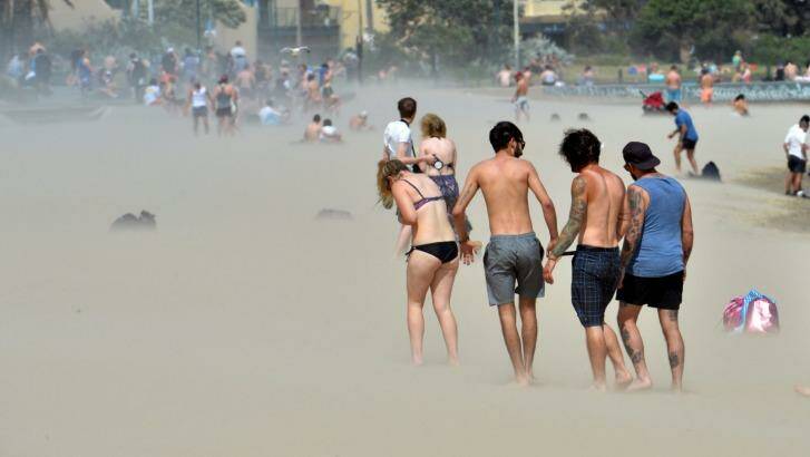 Windy weather disturbs beach goers in Melbourne on Tuesday. Photo: Joe Armao