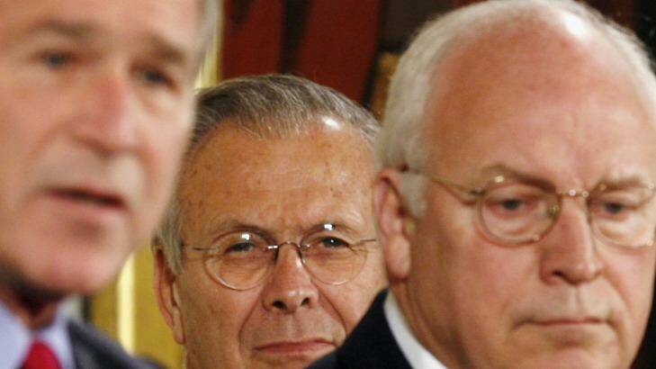 Former president George W. Bush, left, secretary of defence Donald Rumsfeld and vice-president Dick Cheney who held top roles in the United States when it launched the war in Iraq.