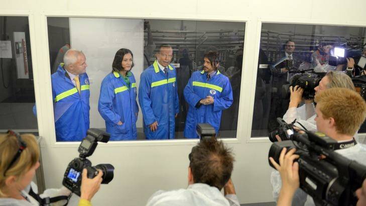 Capping off a horror week, Prime Minister Tony Abbott tours Bulla foods in Colac with local MP Sarah Henderson. Photo: Drew Ryan
