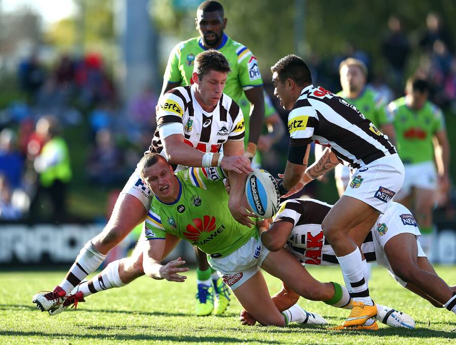 SYDNEY, AUSTRALIA - JULY 26:  Jack Wighton of the Raiders gets a pass away during the round 20 NRL match between the Penrith Panthers and the Canberra Raiders at Pepper Stadium on July 26, 2015 in Sydney, Australia.  (Photo by Renee McKay/Getty Images)