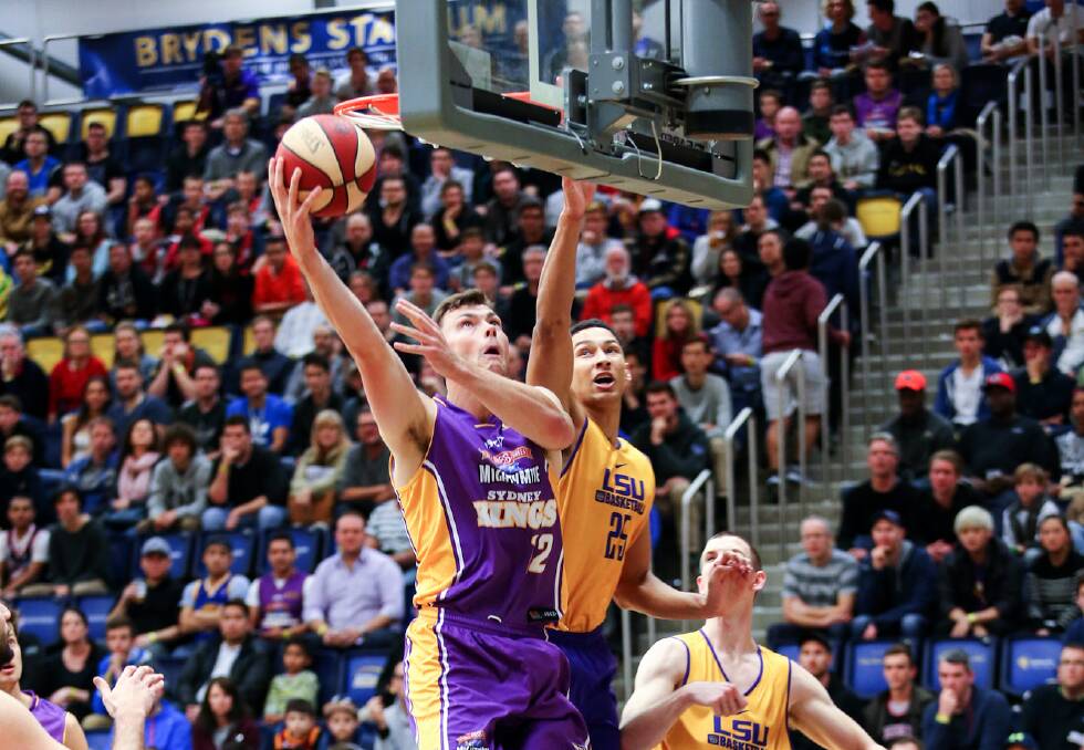 Sydney Kings centre, Springwood native Angus Brandt, on the attack during a preseason game against Luisiana State University. Photo: Geoff Tripp/Kings.