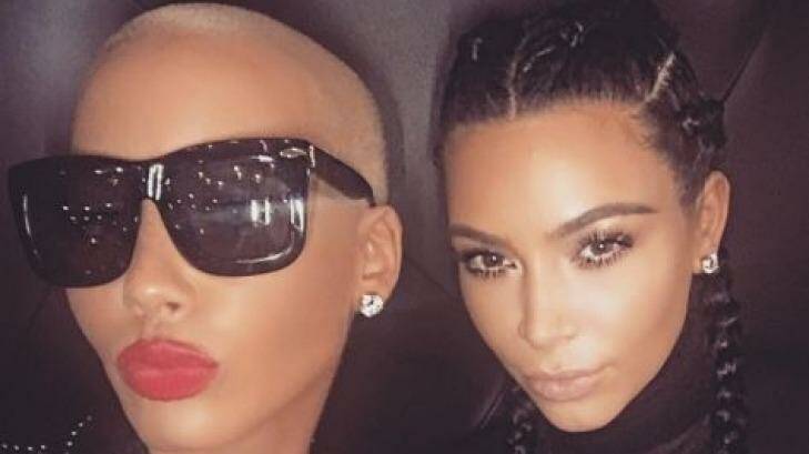 Keeping enemies closer: Kim Kardashian poses with Kanye West's estranged ex Amber Rose after last week's Twitter feud.  Photo: Kim Kardashian/Instagram