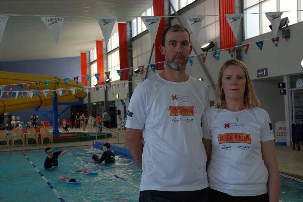 Pete and Carmel Crouch at the final lesson of the Swim and Survive program held at Springwood Aquatic and Fitness Centre, teaching young kids water safety awareness. The couple are also encouraging people to get their pools checked to ensure they are safe, as the weather warms.