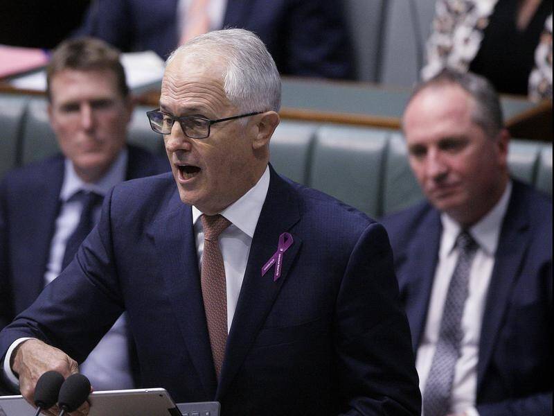 Malcolm Turnbull has backed his ban on ministers fraternising with staffers, angering Nationals MPs.