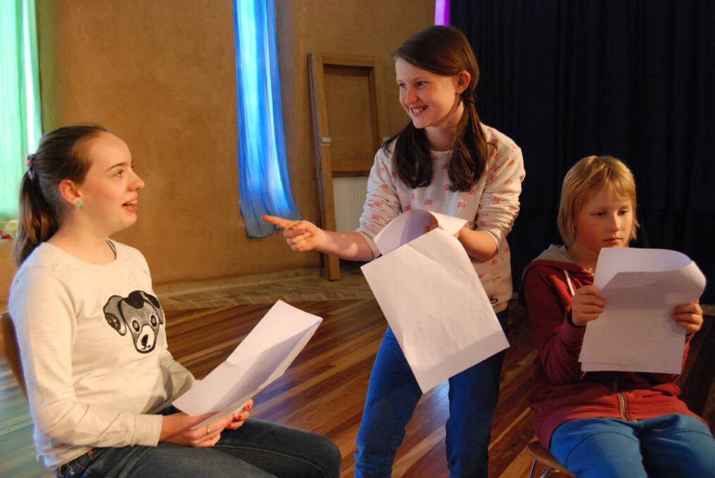 Tabi Ford, April Neale and Patrick Correy rehearse for a script reading.
