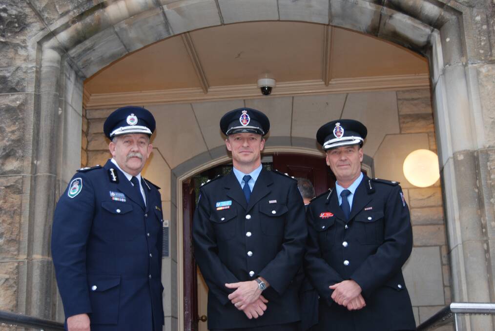 Superintendent Bob Mathieson, manager of fire investigations for the Rural Fire Service, station officer Michael Forbes and Inspector Graeme Moore, both from Fire and Rescue NSW outside Katoomba Court, where they gave evidence concurrently.