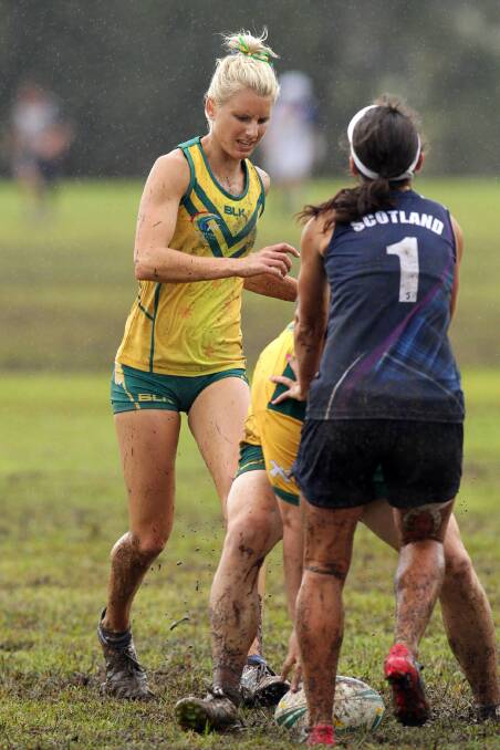 Leah Opie takes on Scotland in the mud. Photo: Glen Eaton/Energy Images.