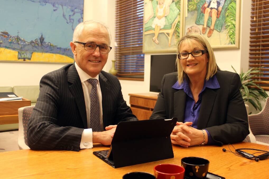 Getting started: Minister for Communications Malcolm Turnbull with Member for Macquarie Louise Markus have welcomed the start of preparatory work for the NBN rollout in the Upper Mountains.