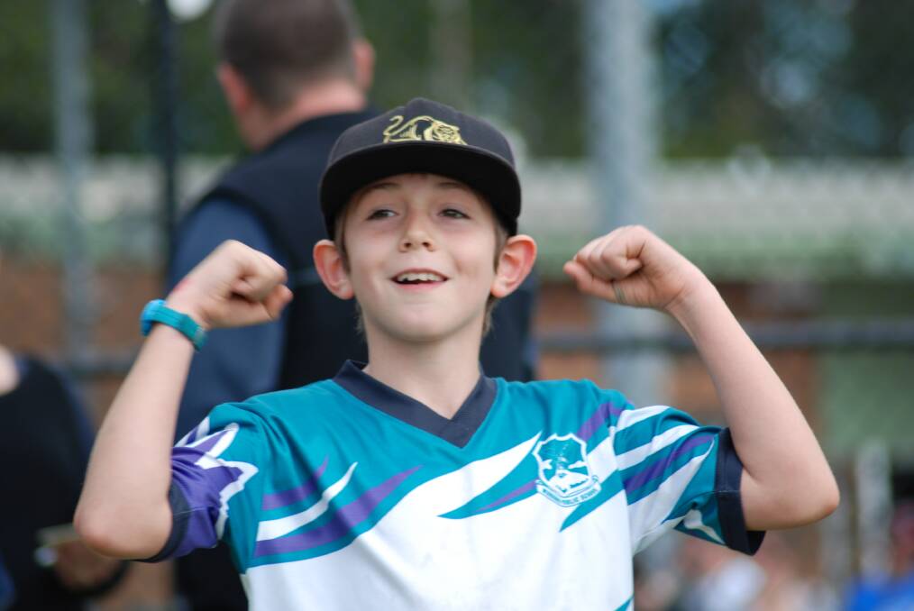Jacob Chambers from Warrimoo Public School celebrates his team's win after a newcombe ball round robin game.