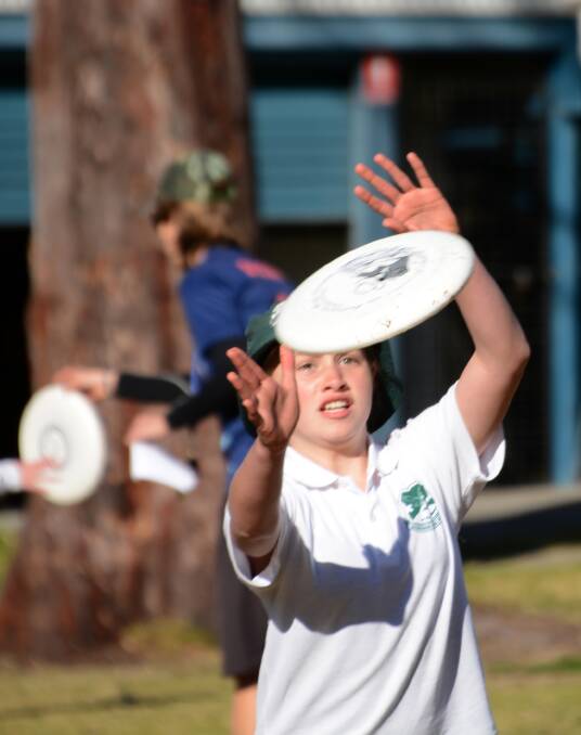 In safe hands: Year 5 Warrimoo Public School student, Lucinda, prepares to take an ultimate frisbee catch.