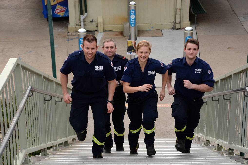 Fire and Rescue NSW retained firefighters Brendon Roberts, Ben Lane, Aliysa Gibbons and Jesse Grant from Glenbrook Fire Station preparing for a charity race to the top of Sydney Tower that will be held on October for to raise money for motor neurone disease research.