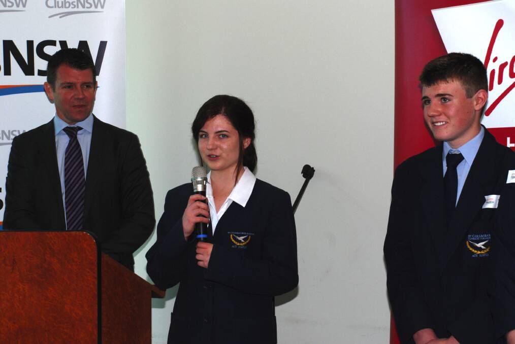 Western Sydney Centenary of Anzac Scholarship winners Madison Thompson and Samuel Lewis from St Columba's Catholic College with Premier Mike Baird on Monday.
