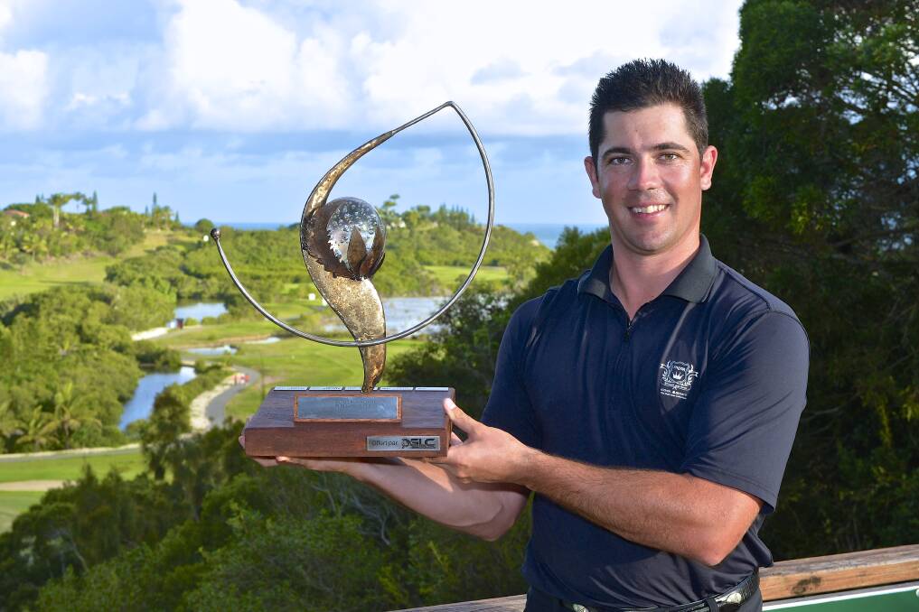 Blackheath golfer Adam Stephens holds up the winner's trophy at the 2014 South Pacific Open Championships at New Caledonia's Tina Golf Course last Sunday.