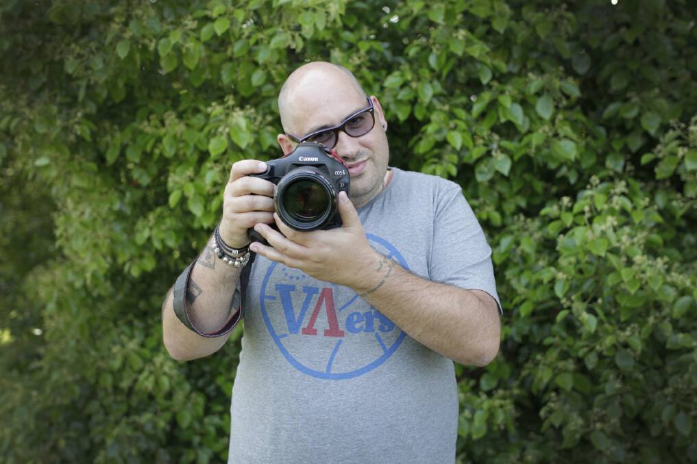 Fairfax Media photographer Simon Bennett lives in Blaxland and is looking for adult volunteers for a portraiture project he is starting up. Picture: Amanda Ryan-Bennett.