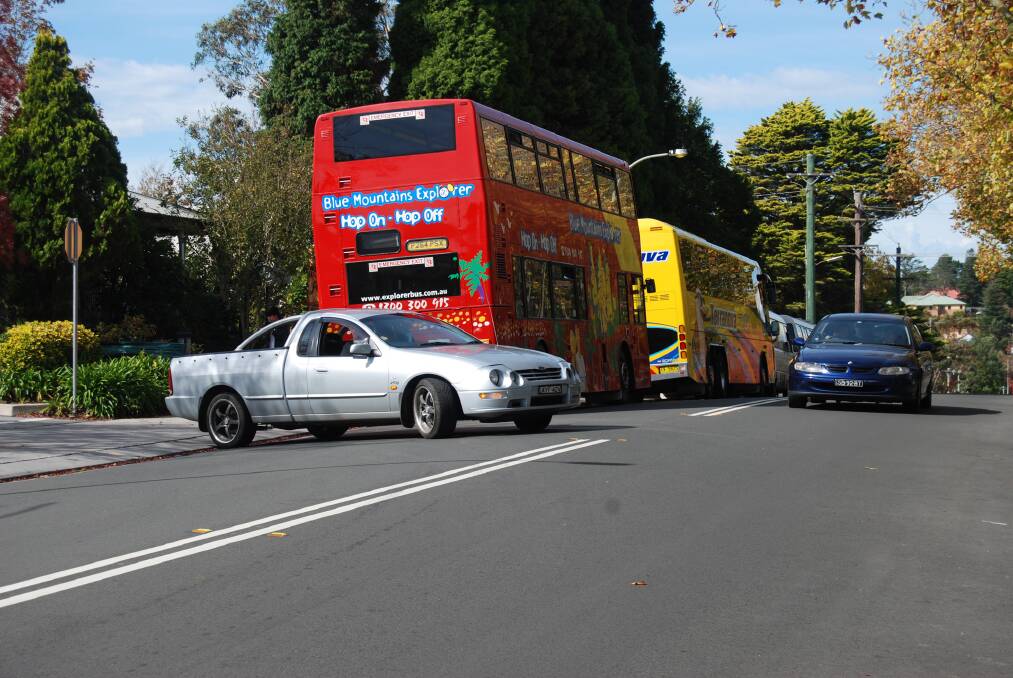 Accident waiting to happen: Trying to see past the buses while getting out of the Leura carpark is no easy feat.