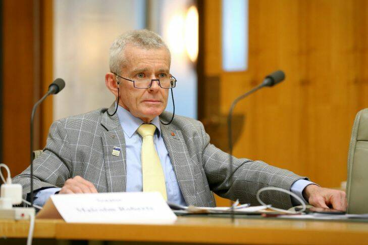 One Nation Senator Malcolm Roberts puts questions to Chief Scientist Dr Alan Finkel during a Senate Estimates hearing at Parliament House in Canberra on Thursday 1 June 2017. fedpol Photo: Alex Ellinghausen 