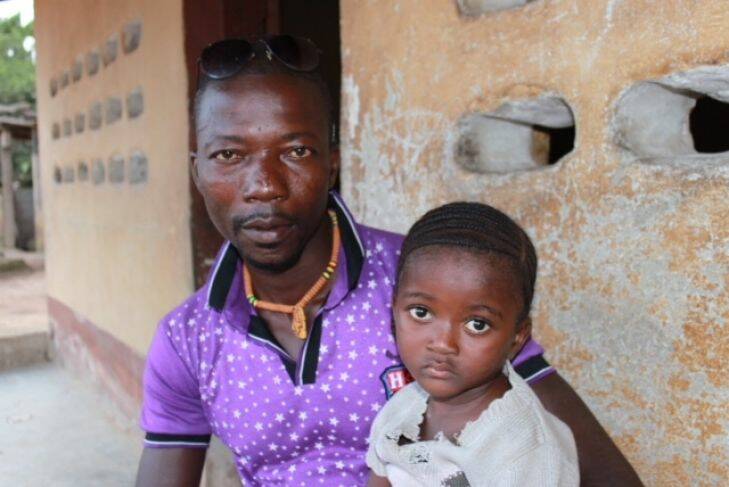 ?? Komba Nyama (with daughter Betsy) who?? drove Mohamed Mansaray to hospital. Mansaray had contracted Ebola in Bumpeh, a small town in Sierra Leone. For Michael Gordon story 18/19 November 2017.