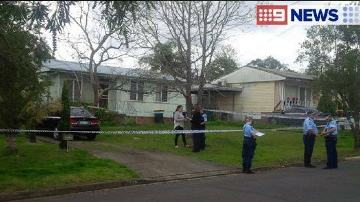 Police at the home in Miller, where a two-year-old girl was found dead on Tuesday.  Photo: Nine News Sydney