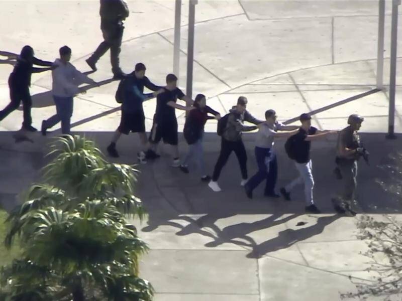 A shooter opened fire at a Florida school, killing multiple people before being taken into custody.