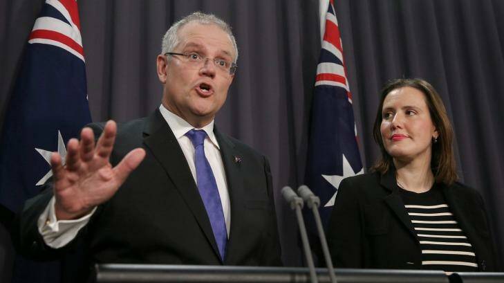 Treasurer Scott Morrison and Minister for Revenue and Financial Services Kelly O'Dwyer address the media during a press conference at Parliament House on Thursday. Photo: Alex Ellinghausen