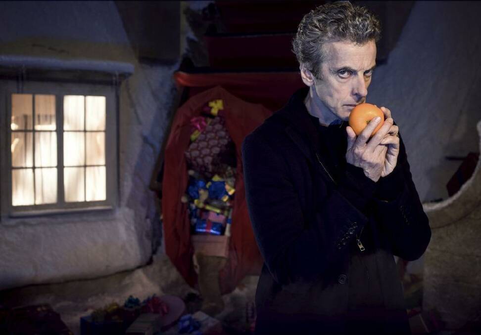 Hushed reverence: Peter Capaldi as the Doctor in the Christmas episode.