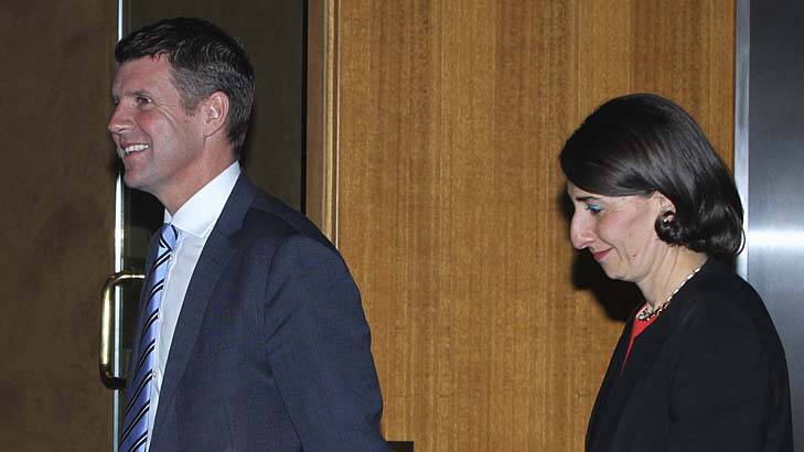 Mike Baird and Gladys Berejiklian leave the Macquarie Room after being selected to lead the state. Photo: Britta Campion