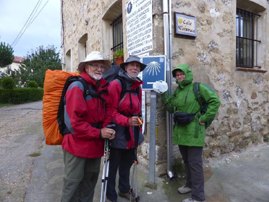 Mel Macarthur (centre) with wife Anne Lawrence and friend, Ian Curtois of Hazelbrook (left) nearing Navarette in Spain, one week into his walk of the Camino Santiago de Compostella.