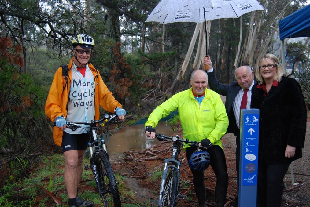 Cycling enthusiast Brian Stevens, Mark McGrath from Upper Mountains Bicycle Users Group, Clr Don McGregor and MP Louise Markus.